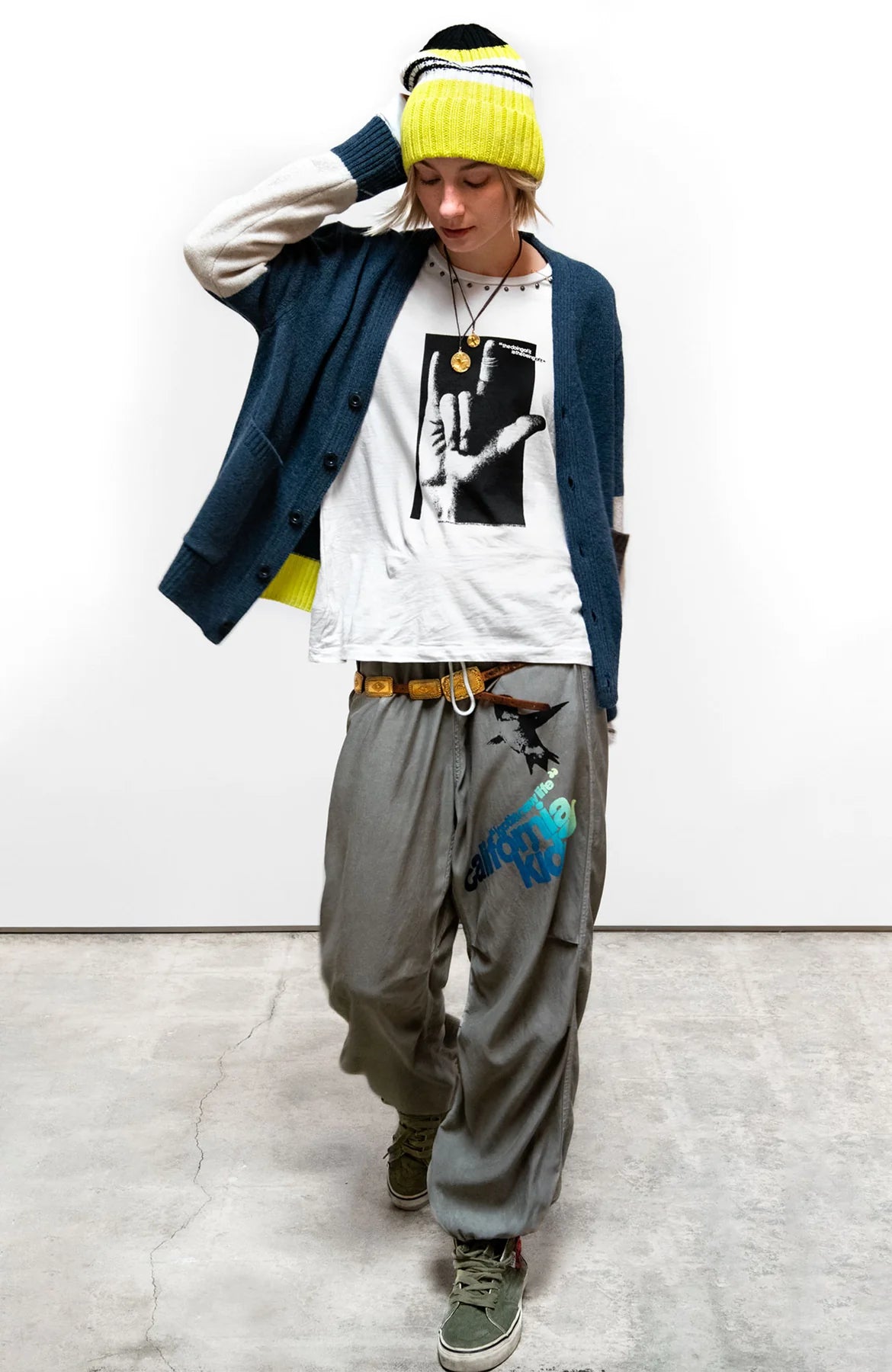 Unisex SUPERLUX CASHMERE PATCH/POCKET cardigan in mineralblue/mix crafted with 100% cashmere made in Italy by Loro Piana® - with custom "PATCH/POCKET" detail, citron "BACKSTRIKE" on back ribbing, cream "FREECITYDOVE" intarsia on right shoulder, cream 3/4 sleeve, and GOLDEN pin on neck-ribbing