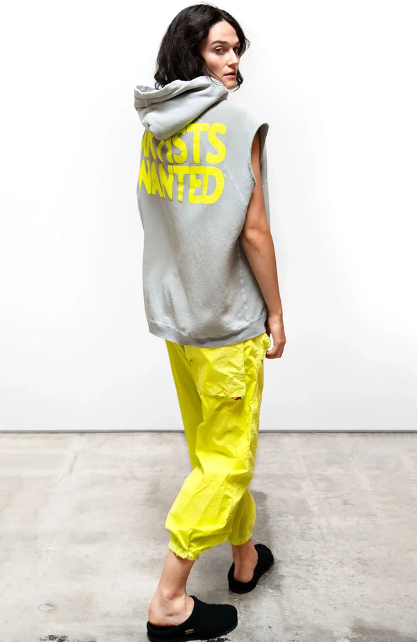 Oversized, unisex ARTISTSWANTED CUTOFF hoodie in silver rock with custom supersaturated sunfade dye process (highs and lows) ARTISTSWANTED back print in yellow, cream "FREECITY DOVE" print on hood and grinding detail at the hem.