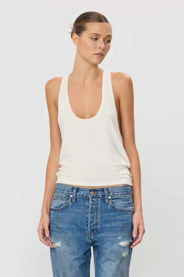 Woman wearing ivory Hedi racerback tank top