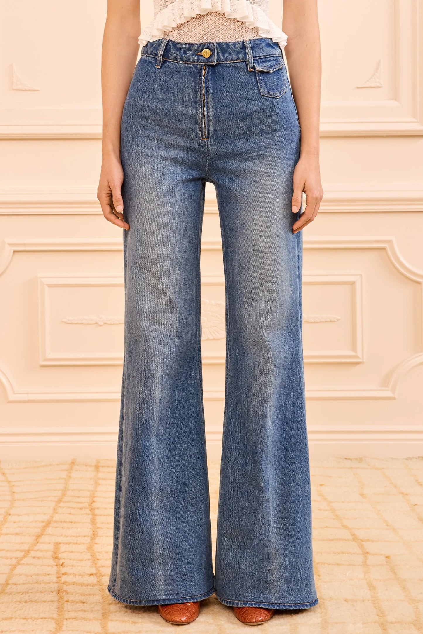 the Odelia Jean takes inspiration from the ’70s with a high-rise waist and a coin pocket detail at the front.