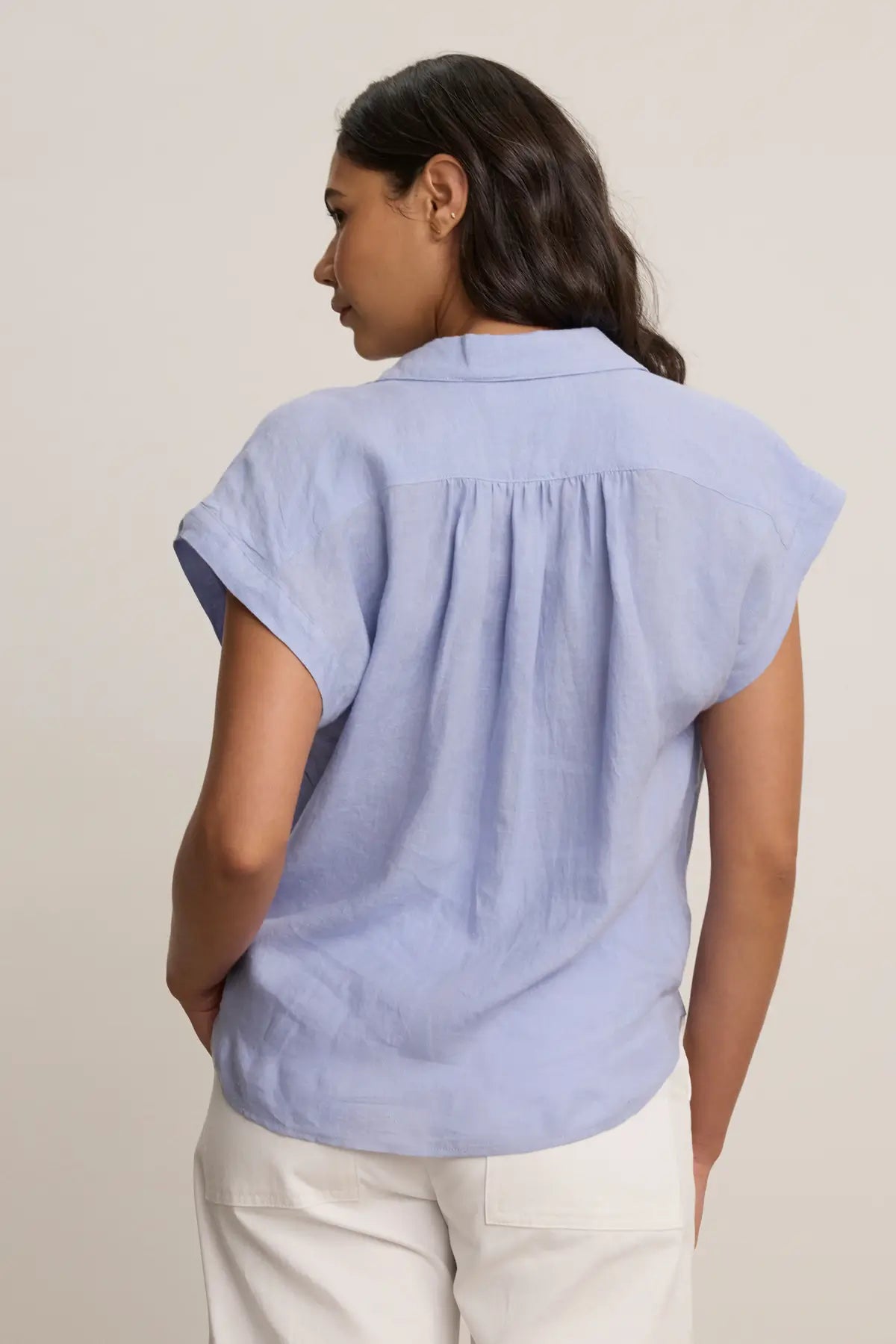 The Elowen Top in Ceramic Blue by Velvet is a breezy button-front blouse crafted from soft, breathable linen.