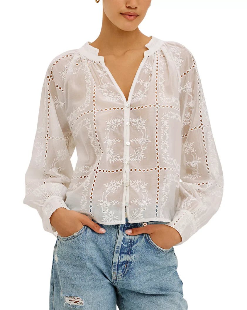 The Francine is a cropped, boxy top in broderie anglaise eyelet cotton, featuring a V-neckline with split band collar