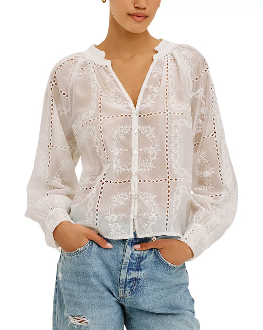 The Francine is a cropped, boxy top in broderie anglaise eyelet cotton, featuring a V-neckline with split band collar