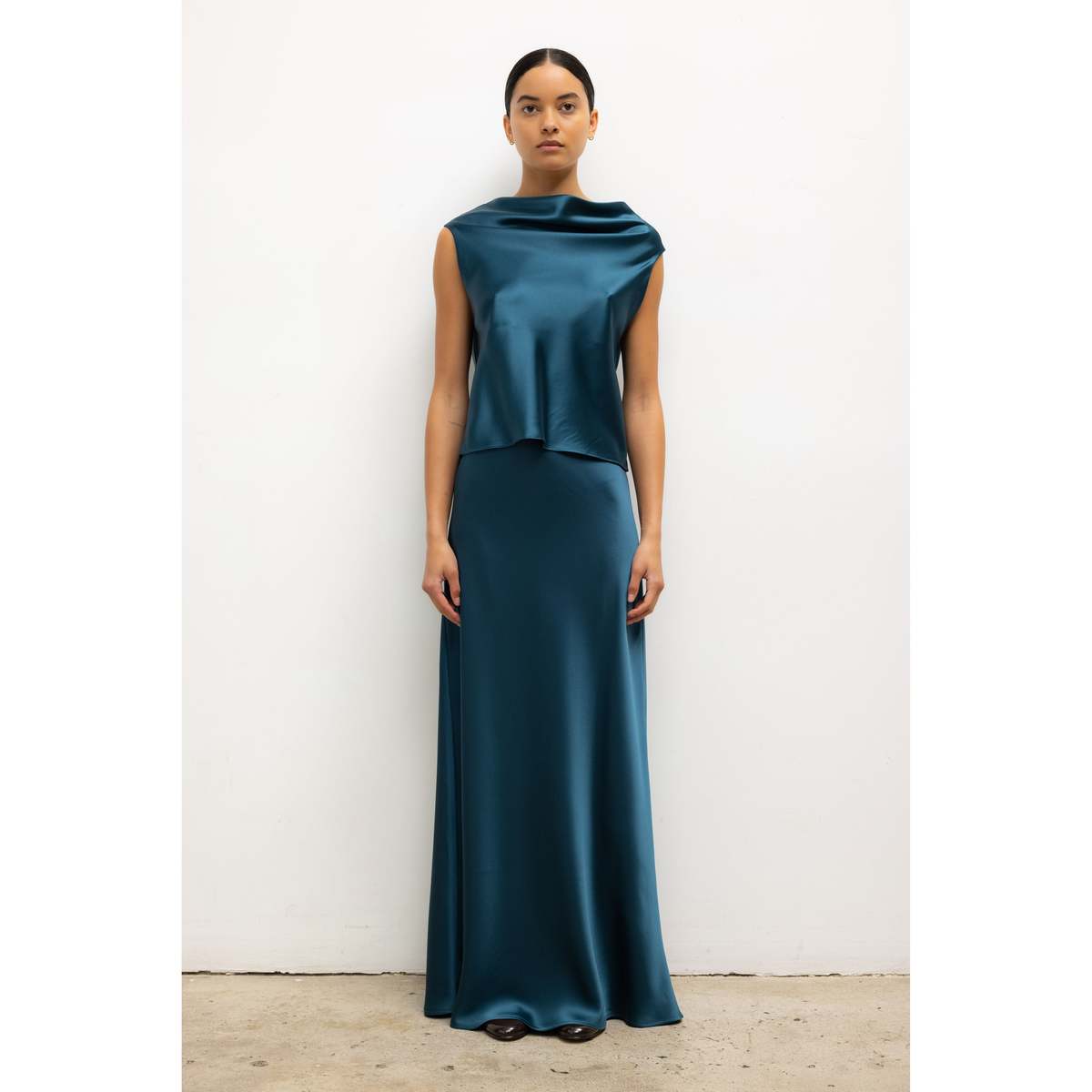 LESET Barb Bias Skirt in Pacific teal Japanese satin, styled with a matching draped satin top for a tonal look
