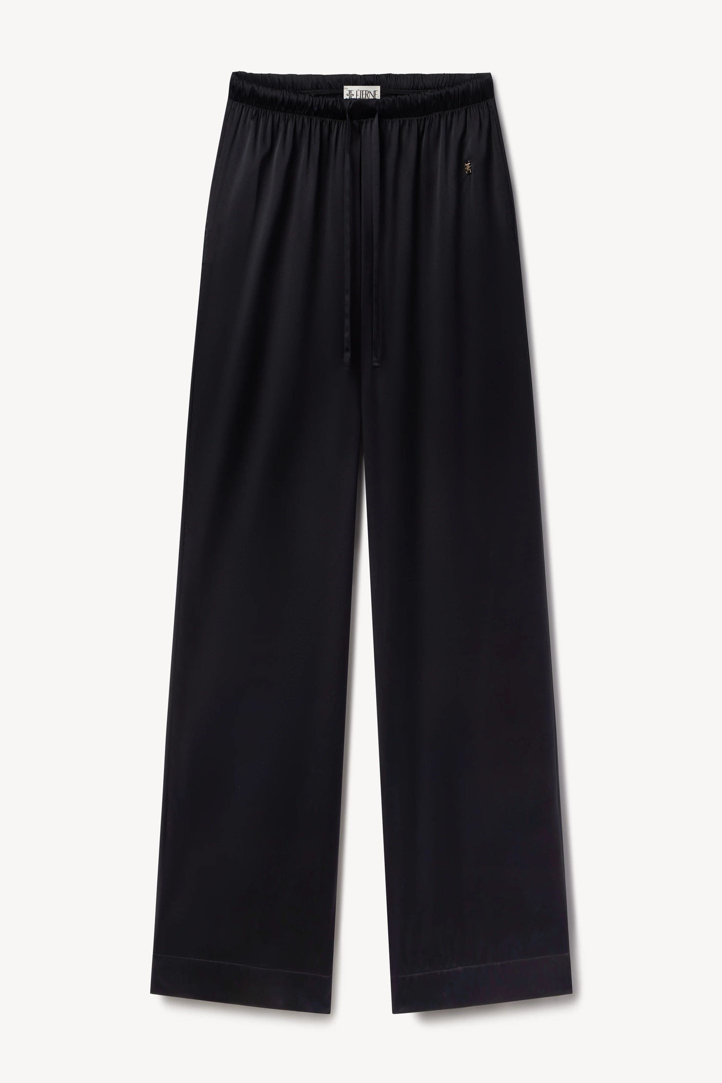 woman wearing black silk pant - eterne brand brody pant.