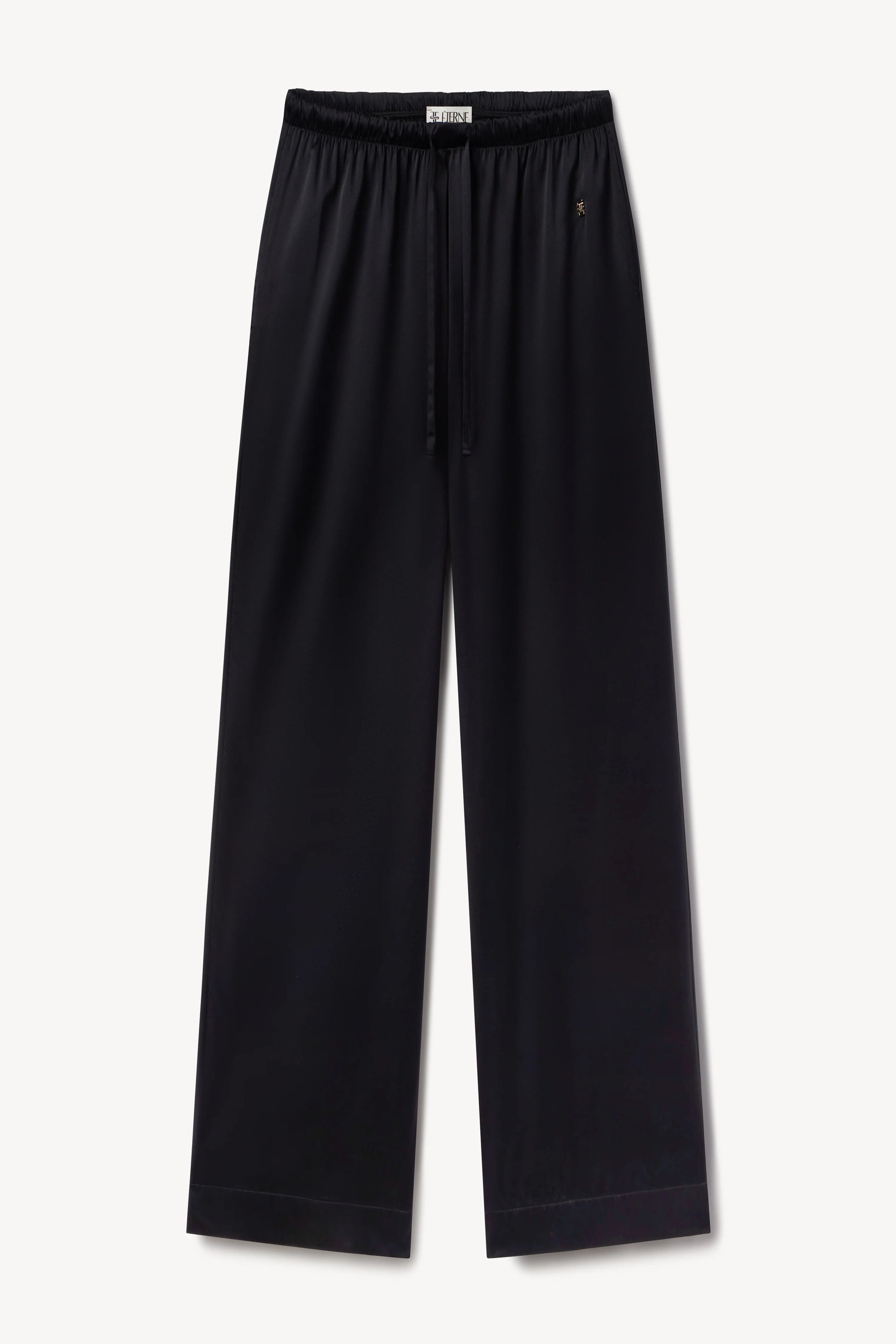 woman wearing black silk pant - eterne brand brody pant.