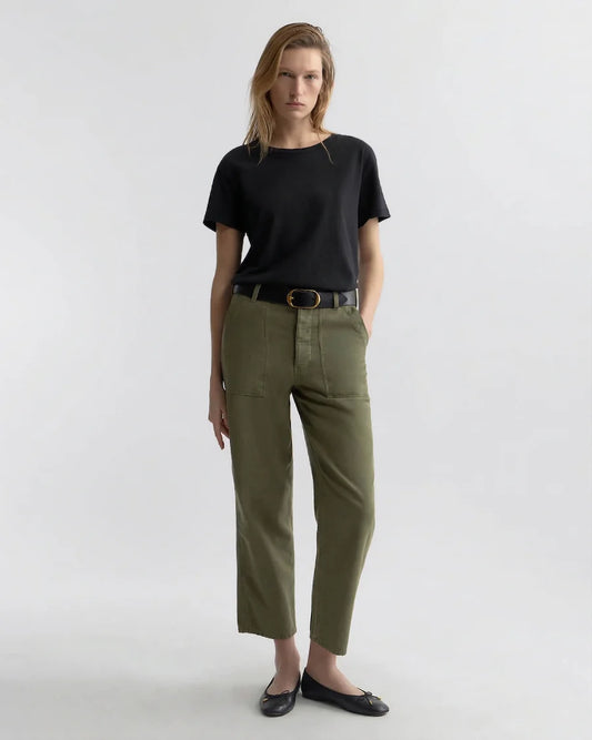 Woman wearing olive green pants from Nili Lotan