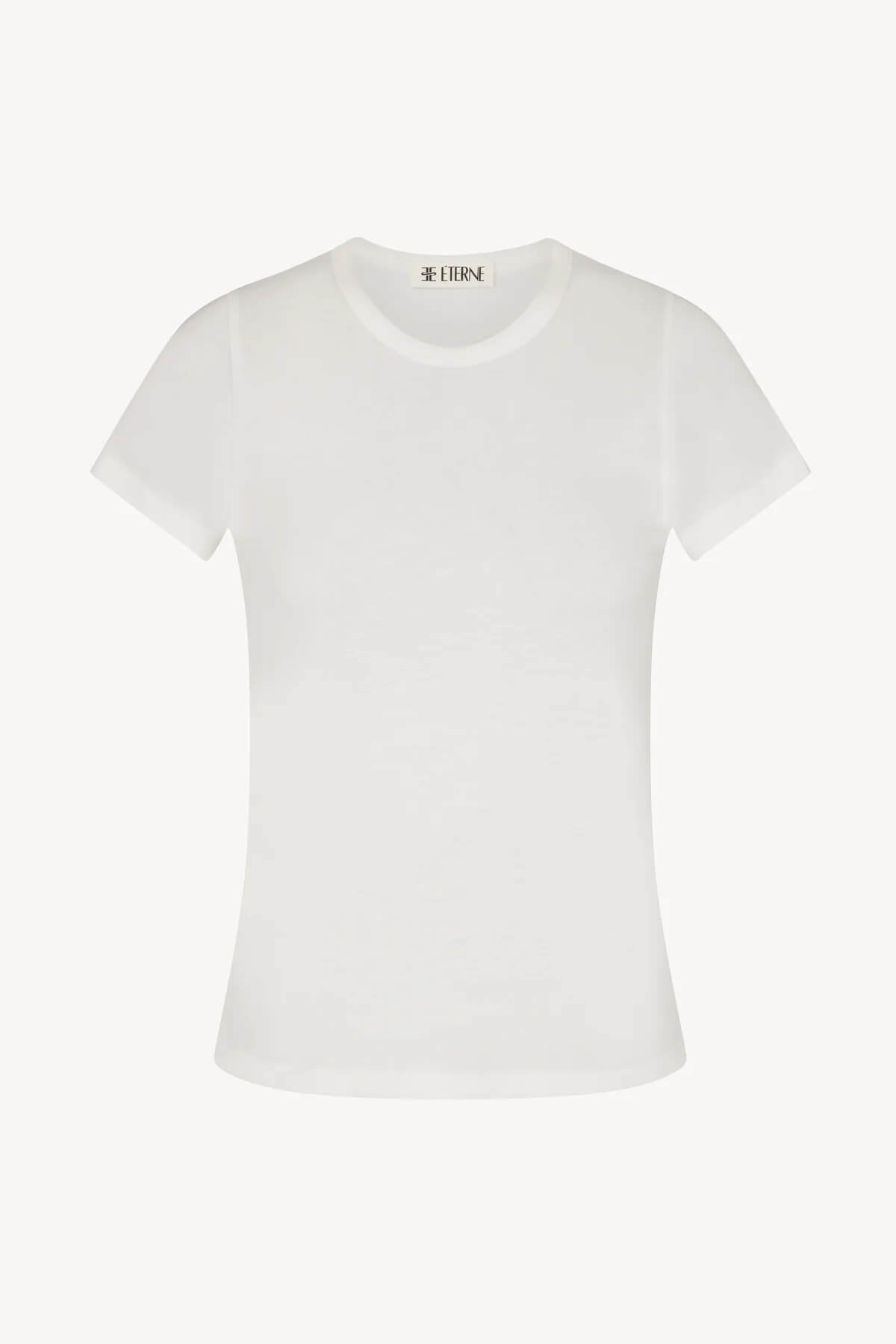 Discover the perfect balance of comfort and style with the ÉTERNE Fitted Crewneck Short Sleeve T-Shirt in ivory.