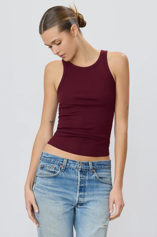 Woman wearing fitted ribbed tank in Oxblood