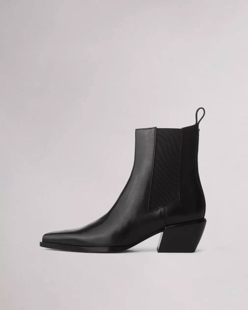 The Joni. A Chelsea boot designed to be worn with any pant leg shape from day to night. Our ankle boot is crafted in leather with a squared-off pointed toe and features elasticized gores and back pull tabs. Crafted with dual-density antimicrobial foam insoles: OrthoLite® Lazy-Hybrid™ for custom-fit comfort, and OrthoLite® Recycled for stability and support.