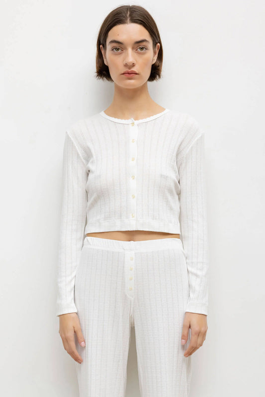 LESET Pointelle Crop Cardigan in White, featuring delicate pinhole stripes, scalloped trim and button-front styling with matching pointelle pants.