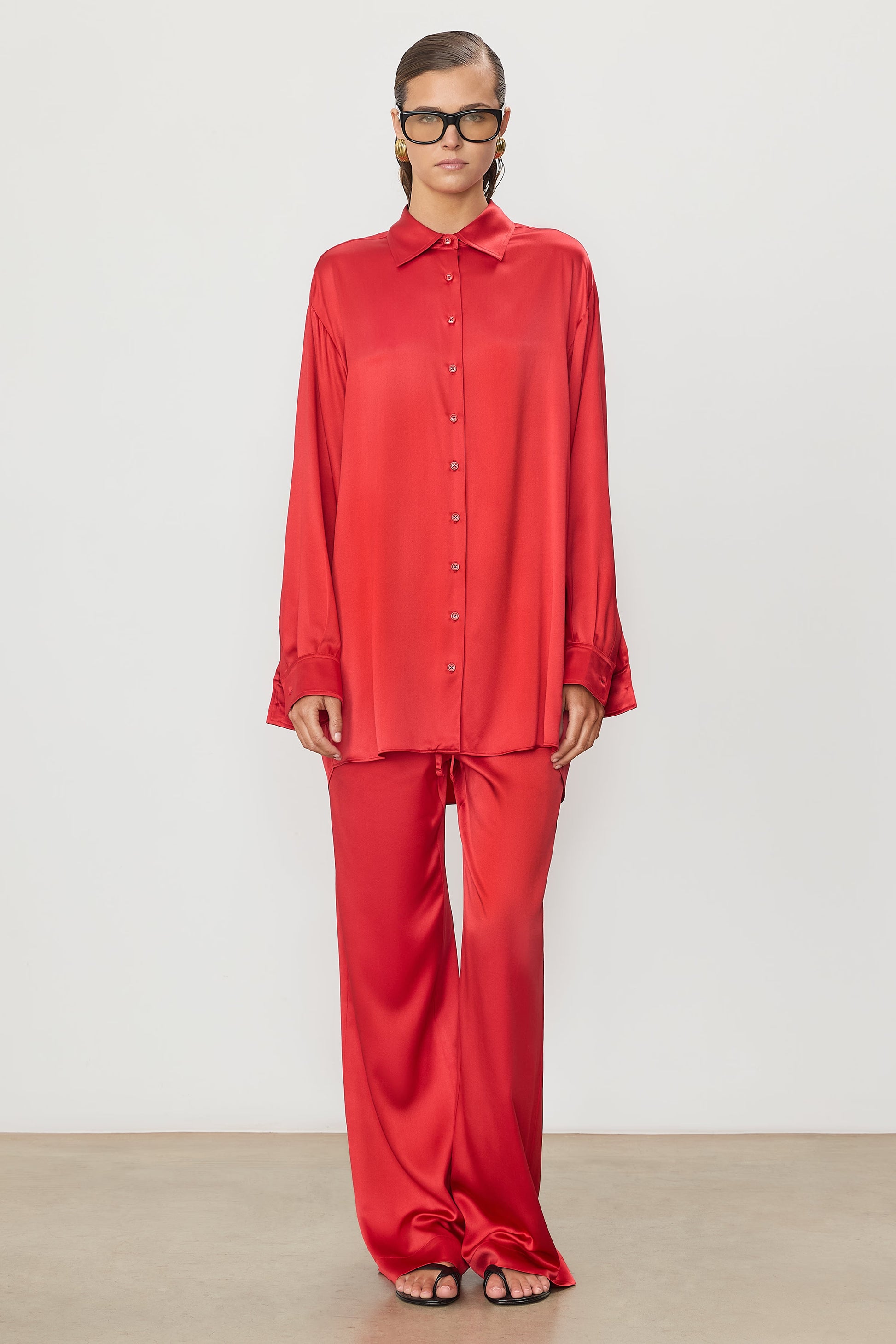 Fabulous silk Brody Pant in striking red by ÉTERNE. A relaxed fit, drawstring waist, super fun and stylish for any event.