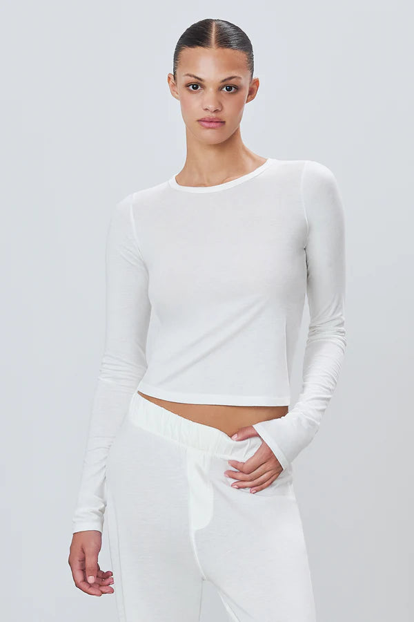 woman wearing white long sleeve t-shirt