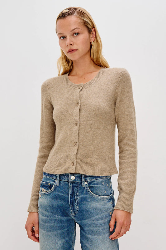The Matilda is a cropped take on the cardigan, with a luxurious cashmere blend. It's cute enough to wear on its own or add dimension by layering.