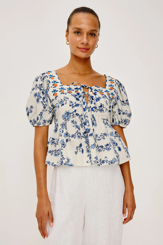 Freshly feminine, the Presley is a crisp cotton poplin top with a boxy, cropped fit and peplum hem. 