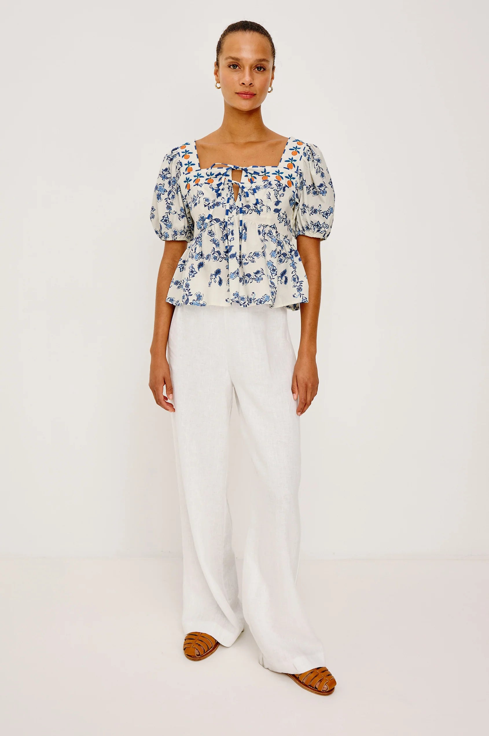 Freshly feminine, the Presley is a crisp cotton poplin top with a boxy, cropped fit and peplum hem. 
