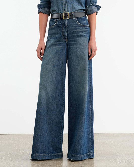 Mid-rise relaxed super wide leg jean in Japanese denim. Five pocket detail. Zip fly. Shank closure. Belt loops.

Made in USA