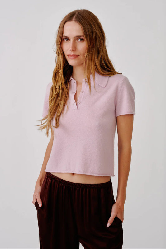 woman wearing pink cashmere polo 