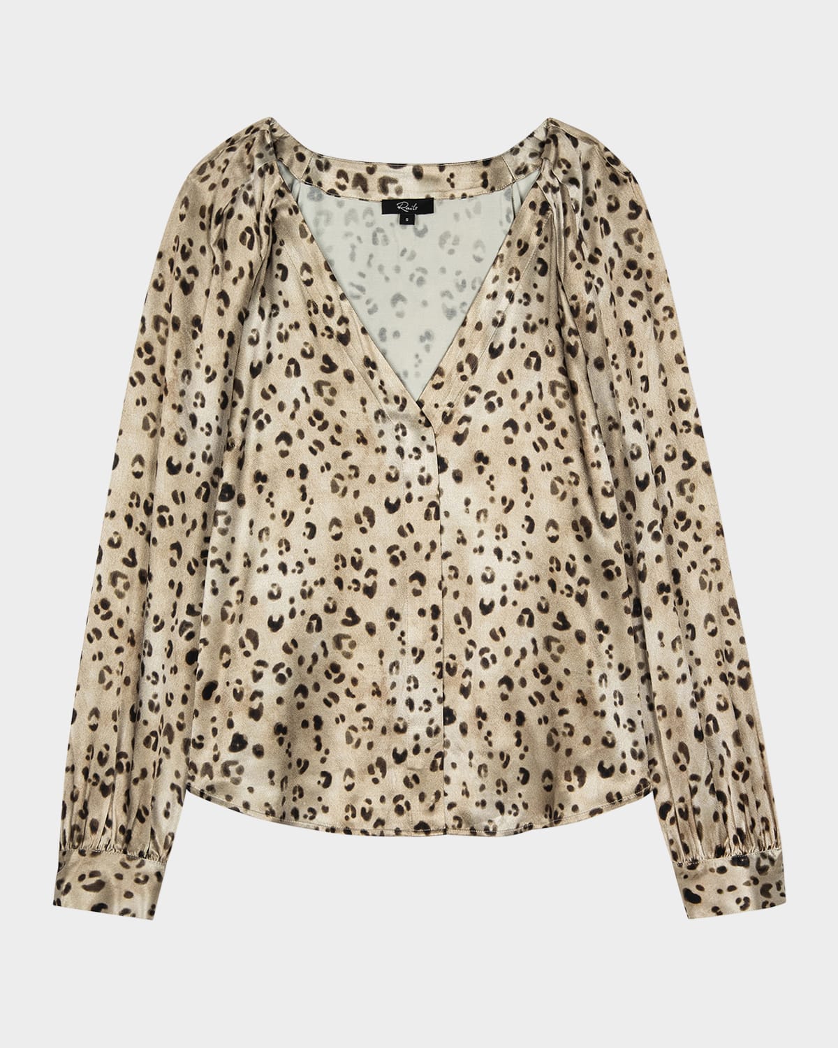 A photo of a v-neck leopard print beige silk blouse long sleeve