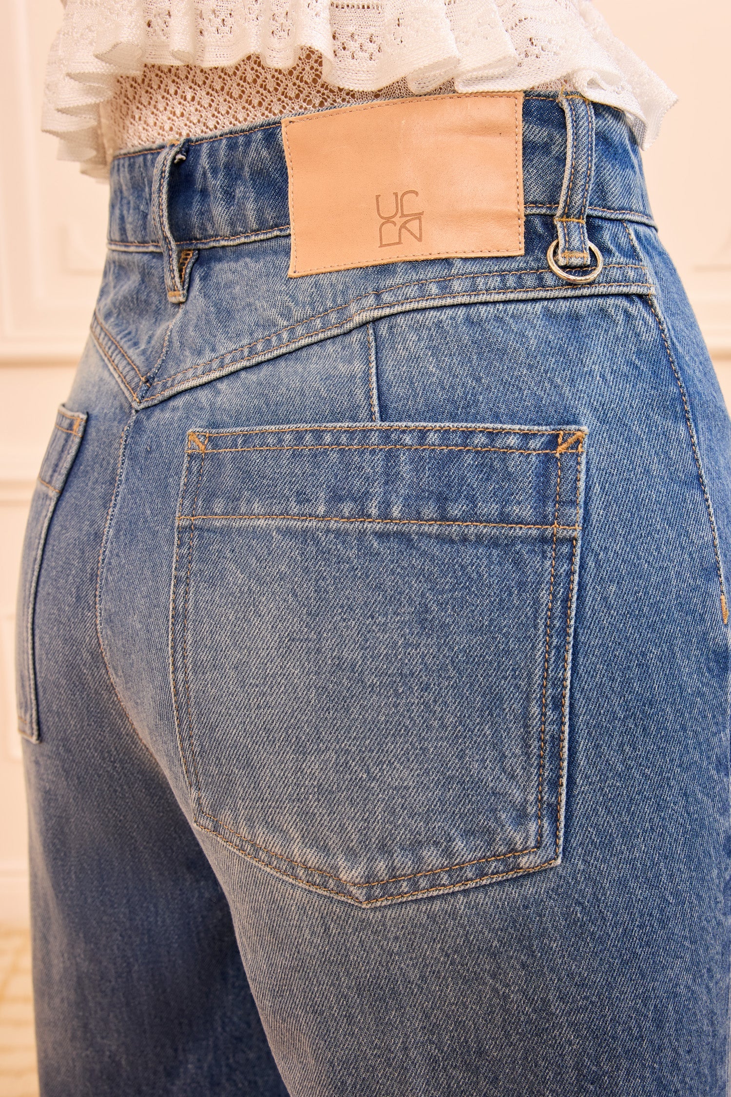 the Odelia Jean takes inspiration from the ’70s with a high-rise waist and a coin pocket detail at the front.