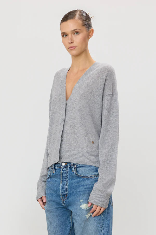 woman wearing grey cashmere button down boxy cardigan