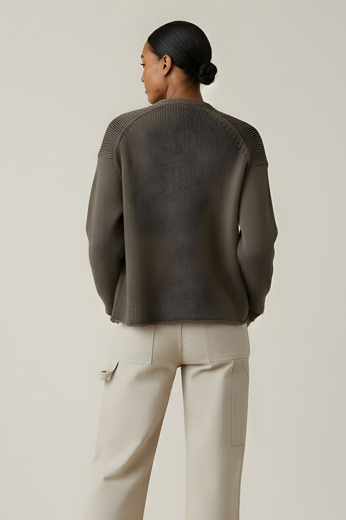 Light, relaxed, and effortlessly stylish, the Quinnly is an open-front cardigan crafted from cotton tape yarn with a long drop shoulder silhouette. 