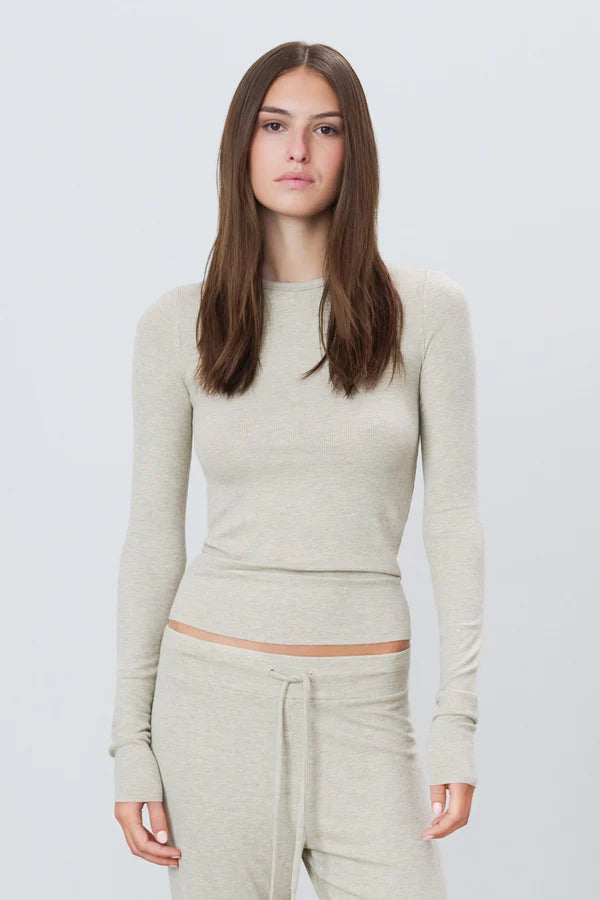 woman wearing ribbed longsleeve fitted top in heather oatmeal 