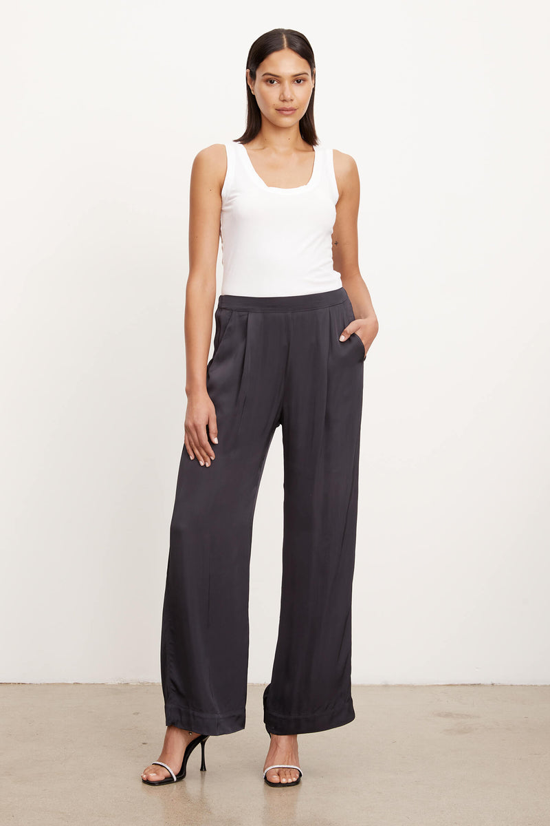 Crafted from our satin viscose, these pants have fantastic light weight, easy drape and flawless fit. Featuring an elastic at the back of the waistline these dressy duds are pull-on and go.