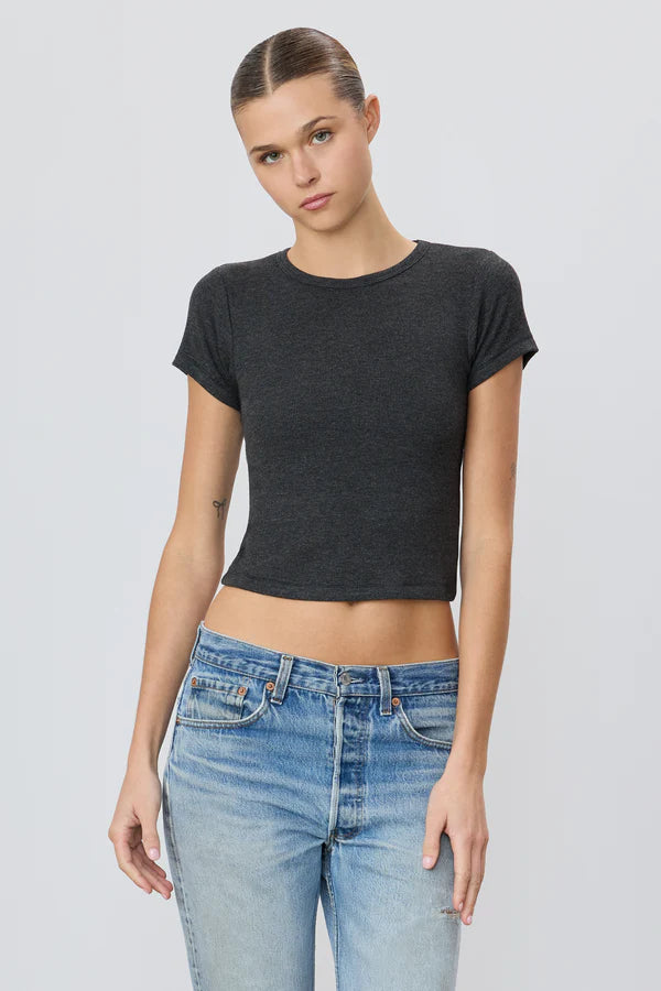 woman wearing ribbed dark grey tee