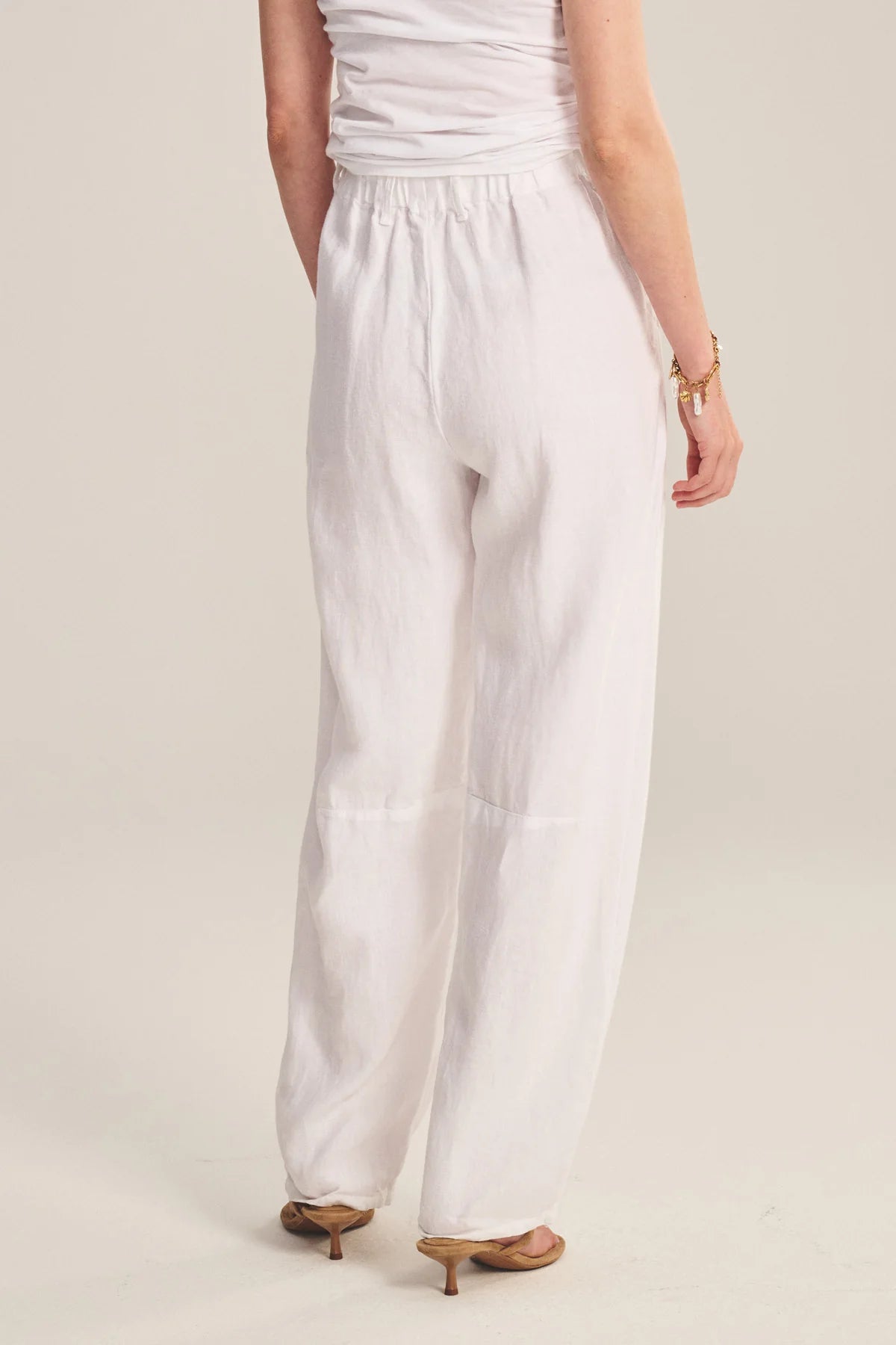 Crafted from heavier-weight linen, these pants offer added structure with a refined, tailored feel. 