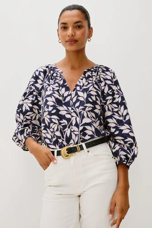 This top pairs effortlessly with jeans or skirts, providing versatile looks for any occasion. Enjoy both comfort and style with this thoughtfully designed piece.