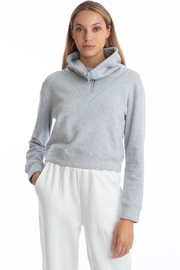 Front view of Juicy Couture High Collar Half Zip top in Grey zipped up showing off the "J" zipper